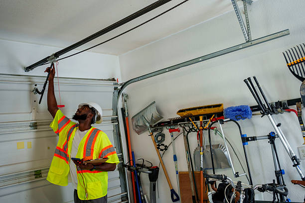 Professional Garage Door Panel Replacement technician working in Springmont, PA